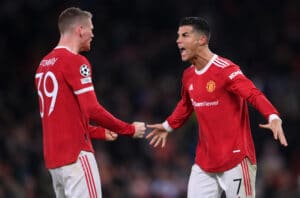 Cristiano Ronaldo qui célèbre un but avec Manchester United lors d'un match de Ligue des Champions.